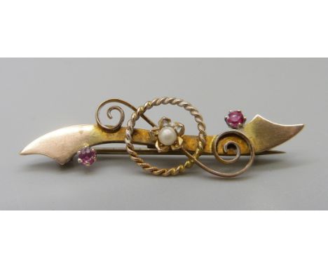 A 9ct gold, ruby and seed pearl brooch, 1.7g, metal pin 