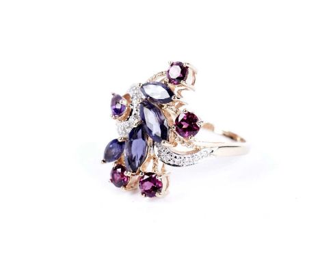 A garnet, iolite and diamond dress ring, in yellow gold setting and shank, stamped '14K', size Q 1/2, 5.0g gross.