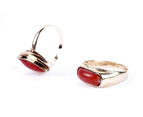 A coral dress ring, in yellow gold, stamped '9K', size Q, 4.0g gross; and another coral dress ring, stamped indistinctly, siz