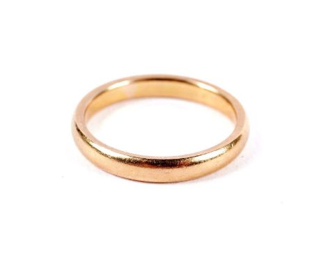 A 22ct yellow gold wedding band, size R, 5.5g gross.