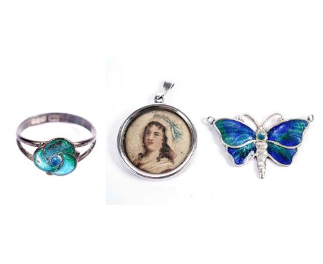An Arts and Crafts silver and enamel ring, of Celtic design, by Charles Horner, Chester 1911; a silver and enamel butterfly p
