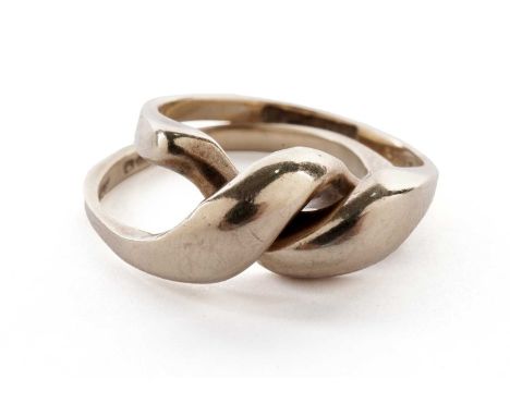 A 9ct yellow gold dress ring, composed of two interlinked bands, size J 1/2, 4.6g gross.