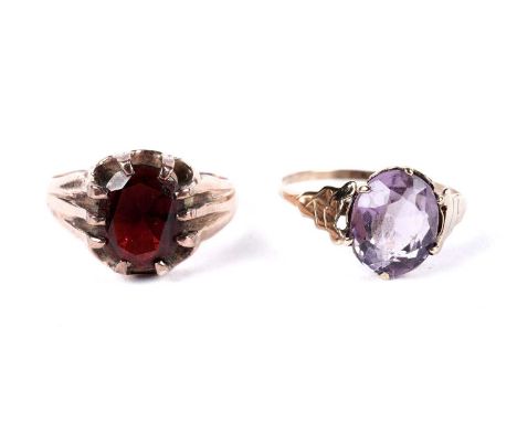 A garnet single stone ring, in 9ct rose gold, size Q, 3.3g gross; and an amethyst single stone dress ring, size P 1/2, 1.6g g
