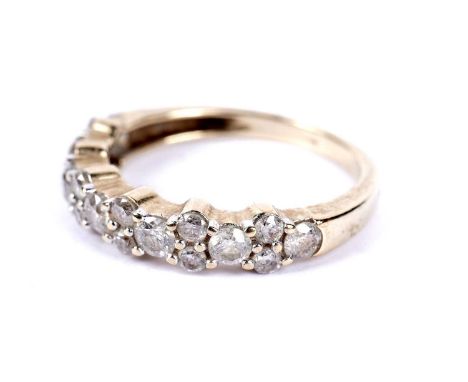 A diamond half hoop eternity ring, in 9ct yellow gold, size N 1/2, 2.8g gross.