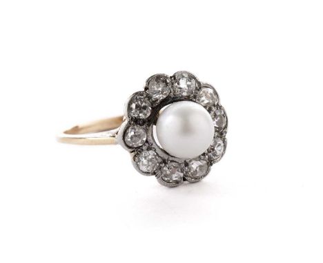 A cultured pearl and diamond flower cluster ring, in yellow metal, unmarked, tests as approximately 14ct gold, size M 1/2, 2.