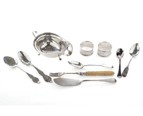 A George V silver cream jug, by C W Fletcher &amp; Son Ltd, Sheffield 1933, 3.2oz gross; two silver napkin rings; and a selec