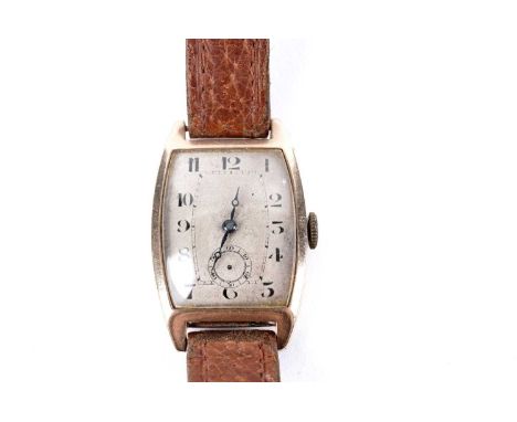 An Art Deco 9ct yellow gold cased manual wind wristwatch, on brown leather strap.