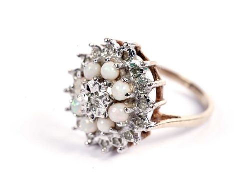 An opal and diamond cluster dress ring, in 9ct yellow gold, size Q, 4.1g gross.