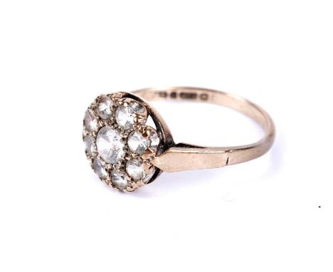 A white stone cluster ring, in 9ct yellow gold, size M, 2.1g gross.