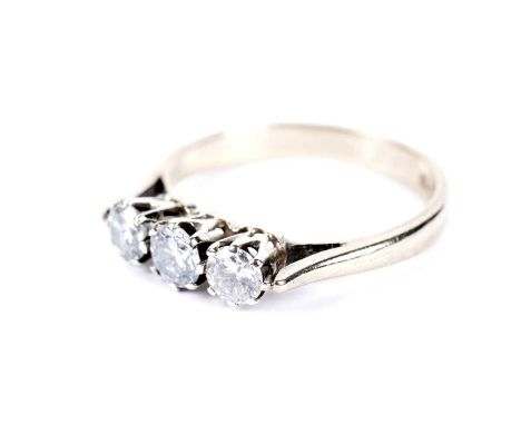 A diamond three stone ring, the round brilliant-cut diamonds totalling approximately 0.55 carats, in 9ct yellow gold, size M,