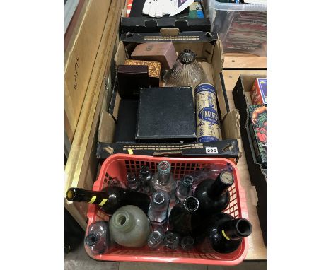 Basket of vintage glass bottles and a box of assorted
