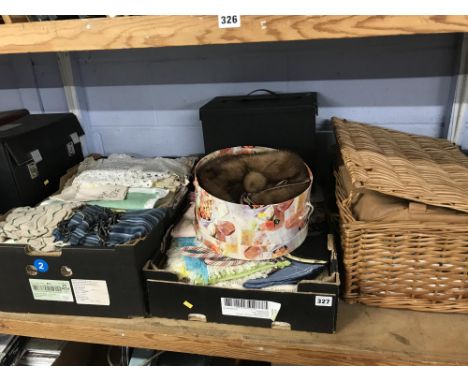 Shelf of table linen etc.