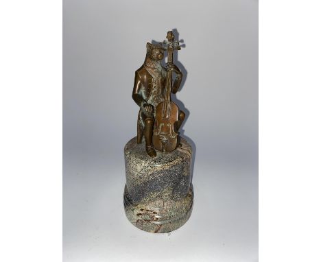 A modern bronze of a cat playing a double bass, supported on a marble plinth