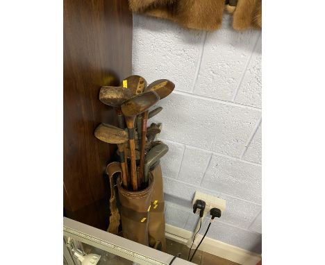 Two vintage sets of golf clubs