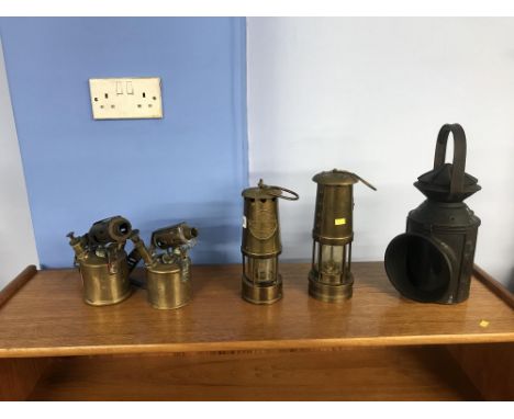 Two Miners lamps, two blow lamps and a Hendry Brothers of Great Clyde Street, Glasgow canal lamp, Number 2856 Carlisle Canal 