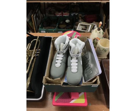 A Mattel Hoverboard and a replica pair of Back to the Future Nike boots etc.
