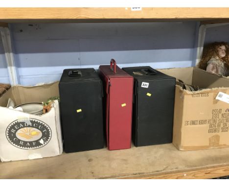 Shelf of albums and two boxes of china