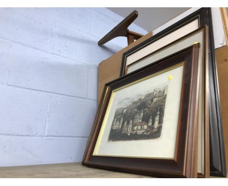 Shelf of prints