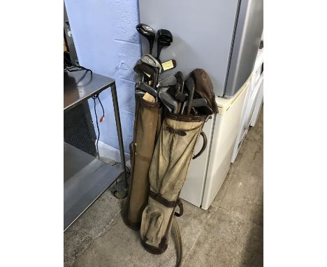 Two bags of vintage Golf clubs