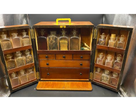 Victorian Medicine Chest containing many of the original medicine bottles and scales. [36 x 32cm][It was assumed these chest 