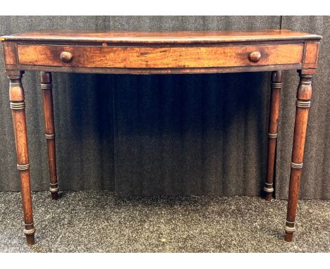 19th Century Console table, the shaped surface above a frieze drawer, raised on turned tapered legs. [79cm x 97cm x 49cm] 