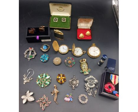 Collection of Scottish Costume Jewellery to include 14 broaches, zip lighter, three pocket watches, cufflinks and badges. 