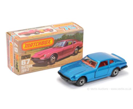Matchbox Superfast 67c Datsun 260Z - metallic blue body, clear windows, red interior, RARE METALLIC DARK CHARCOAL GREY BASE -