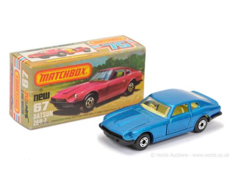 Matchbox Superfast 67c Datsun 260Z - metallic blue body, clear windows, pale yellow interior, matt black base - Mint "New" ty
