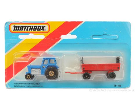 Matchbox Superfast Twin Pack TP-108 Containing (1) Ford tractor - blue body without Ford grille badge, ivory interior, metall