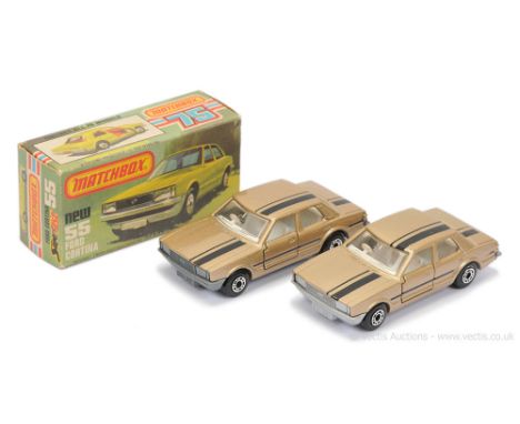 Matchbox Superfast 2 x 55d Ford Cortina - both are metallic champagne gold body with black stripe tampo print, clear windows,