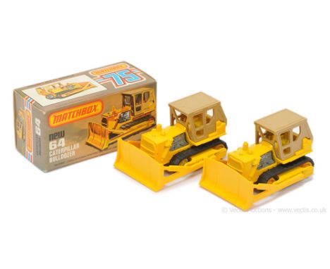 Matchbox Superfast 2 x 64d Caterpillar Bulldozer - both are yellow body with tan plastic cab, yellow plastic blade, bare meta