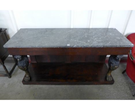 A Regency style mahogany and marble topped console table