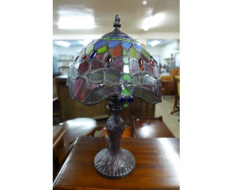 A small Tiffany style lamp
