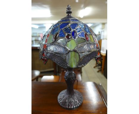 A small Tiffany style lamp