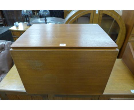 A Tapley 33 teak wall shelf and cupboard