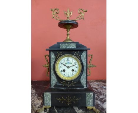 A 19th Century French Belge noir and green marble mantel clock, the movement signed A.D. Mougin Deux Medaille
