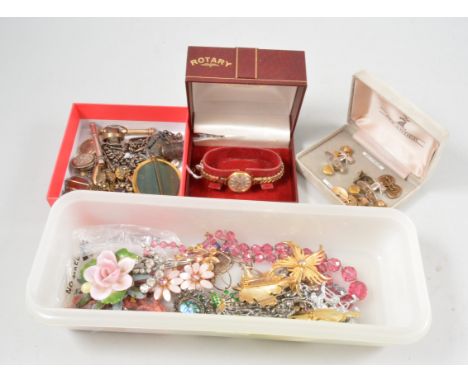 A collection of vintage costume jewellery, gilt metal and paste brooches, a ladies gold-plated Rotary wrist watch, yellow met