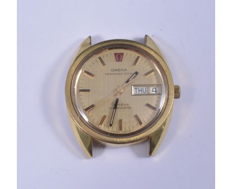 Omega, A gentlemans Megasonic 720hz Geneve Chronometer, circular champagne baton dial with sweep seconds and day/date apertur