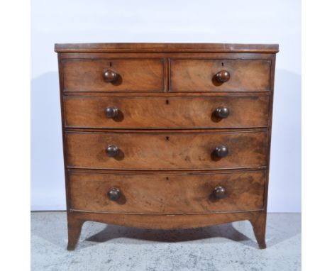 Victorian mahogany bow front chest of drawers, fitted with two short and three long graduating drawers, all with turned handl