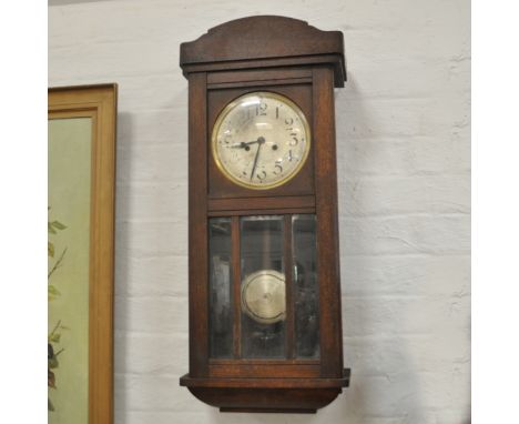Oak wall clock, coal box, warming pan and barometer.