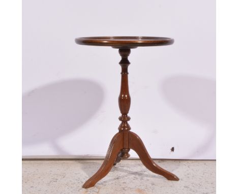A mahogany pedestal wine table, fluted column, tripod legs, diameter 35cm and a three tier cake stand, (2).