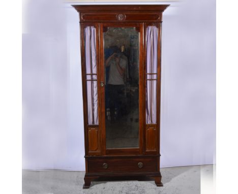 Edwardian mahogany wardrobe, moulded cornice, bevelled mirror panelled door flanked by glazed panels, single drawer under, sp