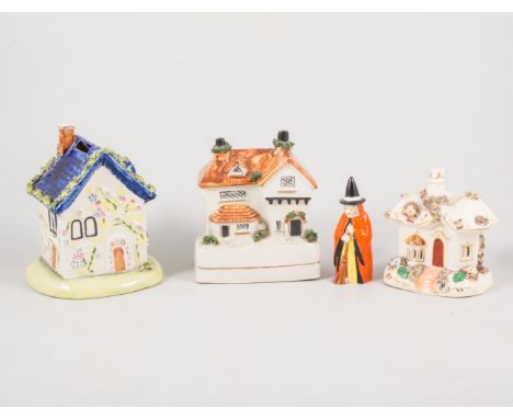 Royal Worcester candle extinguisher, designed as a 'Witch' 9cm, a collection of Staffordshire and other cottages, (13).