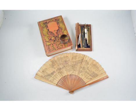 Draughtsman set, case (af), white metal strainer, napkin ring, fan, cigarette cards, and books.