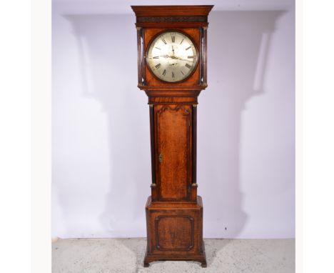 Oak and mahogany longcase clock, the hood with a moulded cornice above a blind fretwork frieze, turned and fluted columns, lo