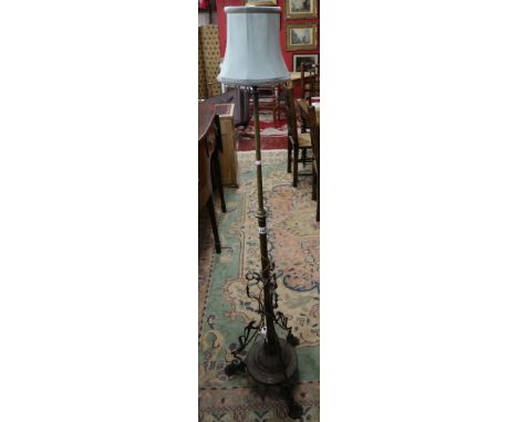Ornate brass standard lamp