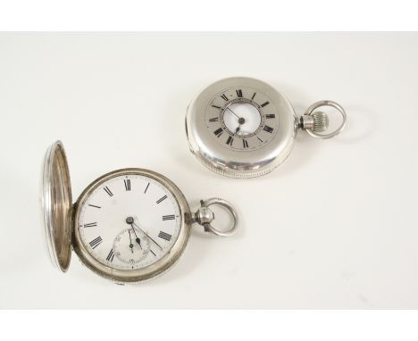 A SILVER HALF HUNTING CASED POCKET WATCH BY J.W. BENSON the white enamel dial with Roman numerals and subsidiary seconds dial