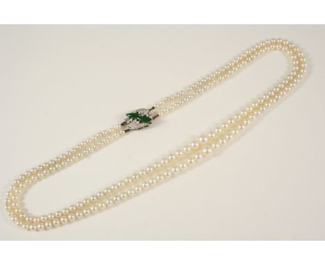 A TWO ROW GRADUATED CULTURED PEARL NECKLACE the cultured pearls graduate from approximately 3.5mm. to 7.1mm. and are set a wh