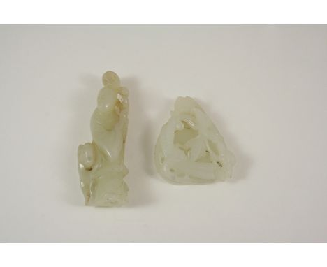 A MUTTON FAT JADE FIGURINE depicting a Japanese woman with her dog, 8cm. long, together with a mutton jade apple amongst flow