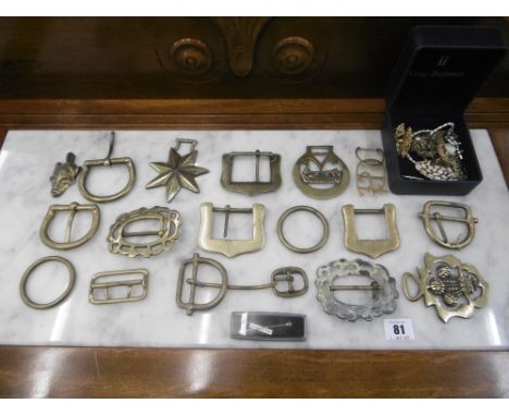 A quantity of bras buckles, costume jewellery and other items